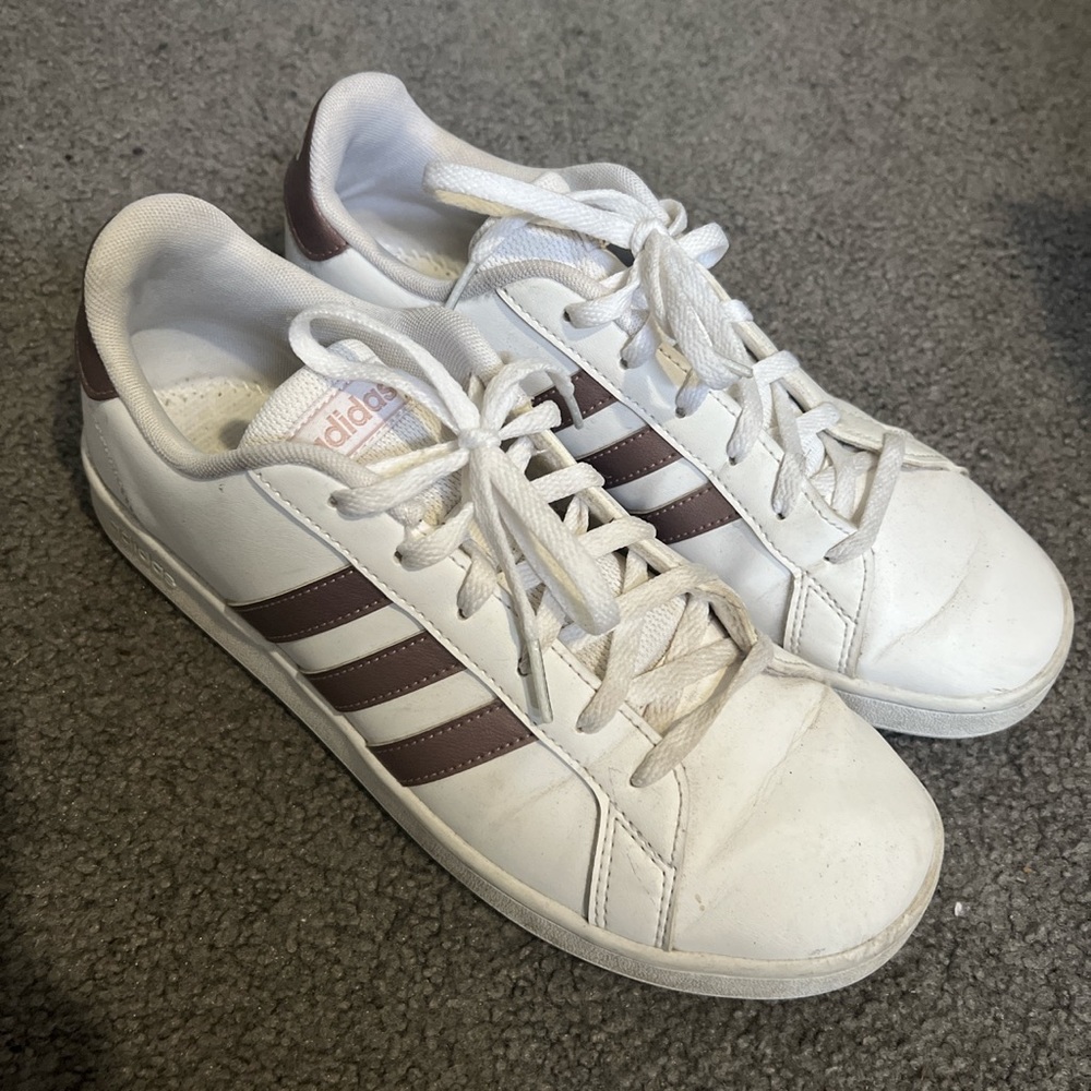 Rose gold and white adidas sneakers